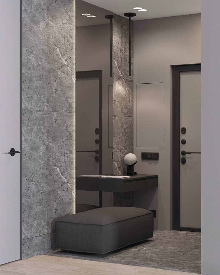 a modern bathroom with marble walls and flooring