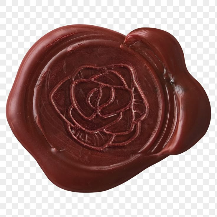 a wax seal with a rose design on the side, transparent background png clipart