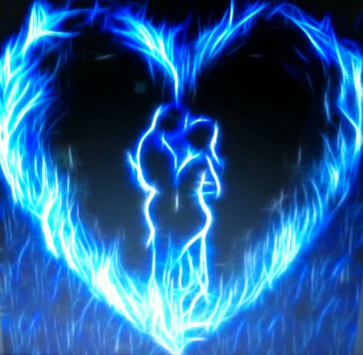 a blue heart with flames in the middle