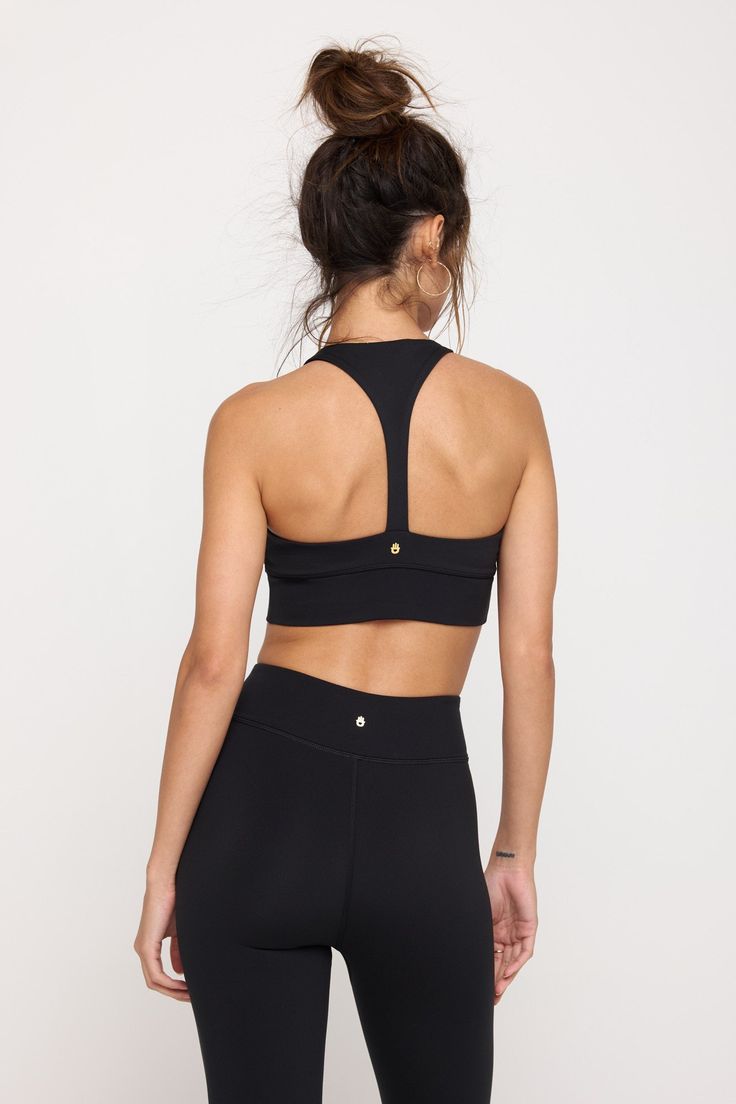 Wrap it up. A moderate support, double-layer bra designed with a sleek racerback. Made in our 4-way stretch Dream Tech eco-conscious fabrication that is compressive, moisture-wicking, quick-drying, and anti-odor. | Evie Wrap Front Bra in Black Yoga Travel, Rainbow Shop, Spiritual Gangster, Eco Conscious, Sweater Jacket, Double Layer, Quick Dry, Jumpsuit Dress, Moisture Wicking