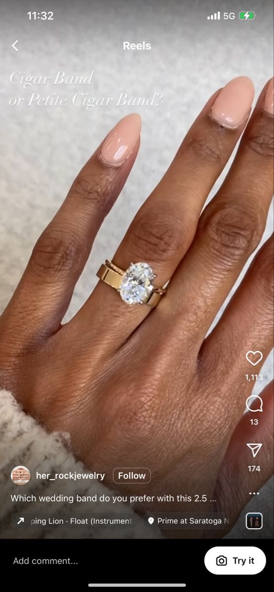 a woman's hand with a ring on it and the screen showing her engagement ring