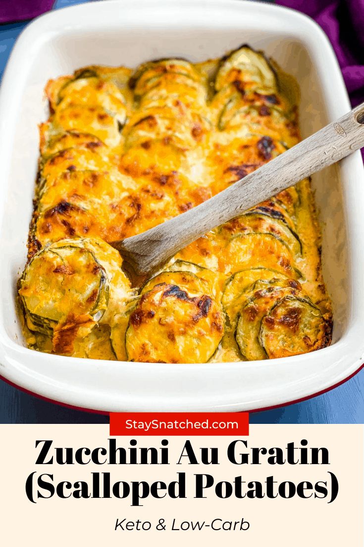 a casserole dish with zucchini in it and a serving spoon on the side