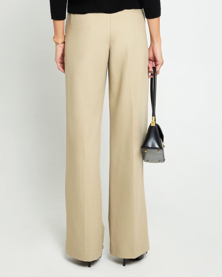 Product Details The Drew Pant boasts a classic khaki design with pleats and pockets for added convenience. Its relaxed fit and high waist provide a comfortable and stylish option for a slack or dress pant. Perfect for any occasion, these pants are a must-have for any wardrobe. - Pockets- Front zipper and clasp- Content: Fabric: 64% Polyester, 30% Rayon, 6% Spandex; Lining: 100% Rayon Style# K24WPAH0383G Fit Notes - Model wearing a size 4 - Model measurements: 5'10'' Height / 32'' Bust / 25'' Waist / 35'' Hips Classic Wide Leg Chinos, Elegant Relaxed Fit Workwear Chinos, Beige High-waisted Pants For Formal Occasions, Elegant Relaxed Fit Chinos For Work, Formal Beige High-waisted Pants, Elegant Beige Chinos With Welt Pockets, Elegant Beige Chinos With Pockets, Classic Wide Leg Neutral Bottoms, Neutral Wide Leg Pants For Workwear In Fall