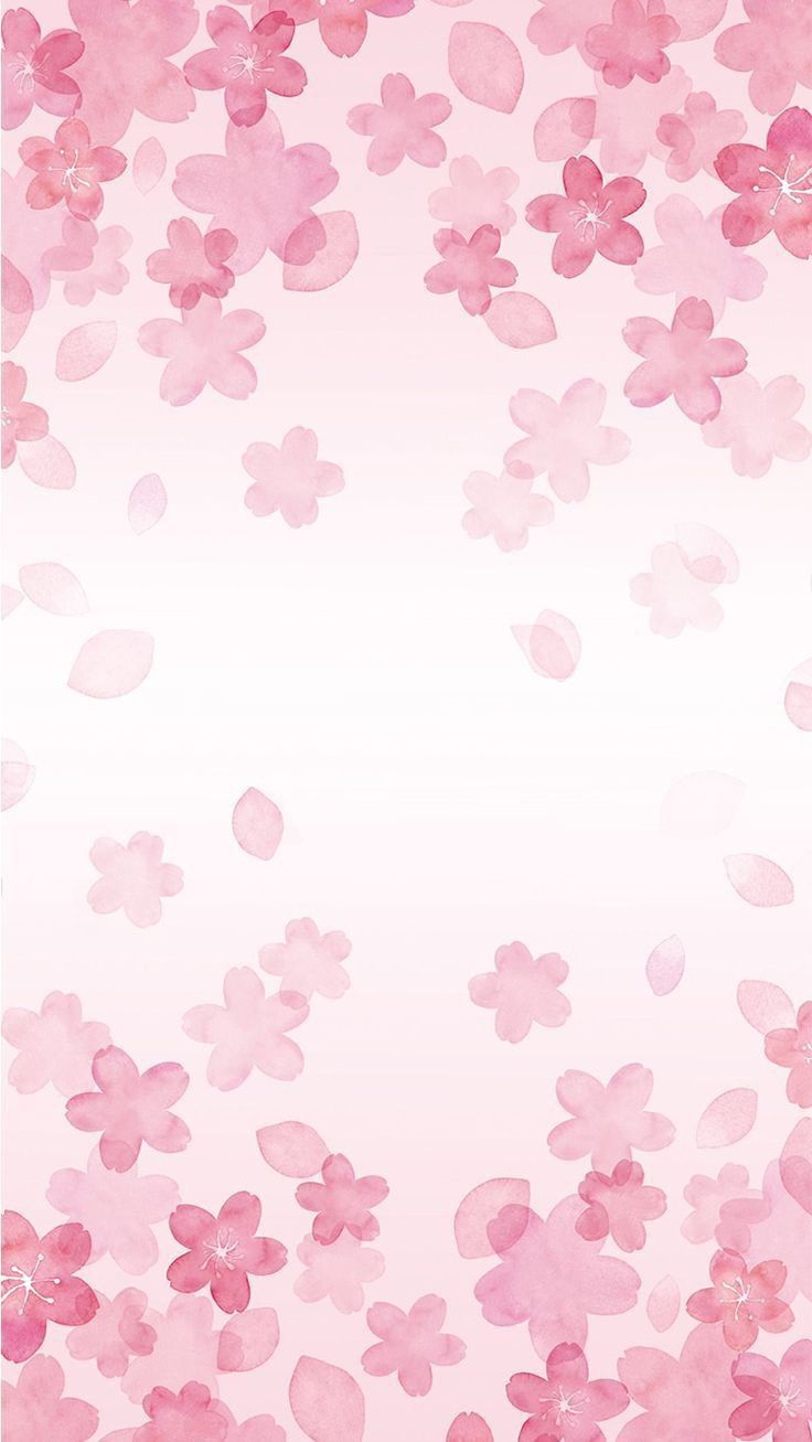 pink flowers are floating in the air