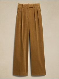 a pair of brown pants hanging on a wall