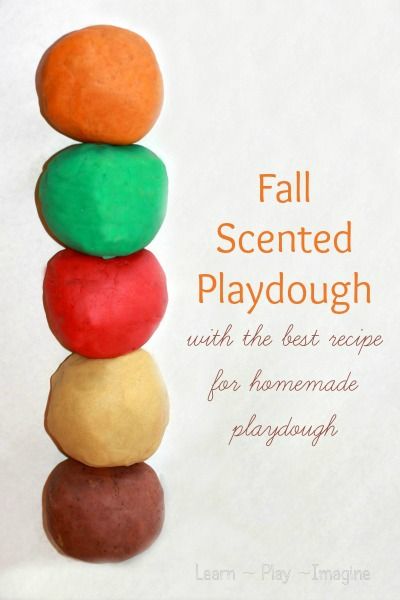 a stack of rocks with the words fall scented playdough written on them in orange, green and red