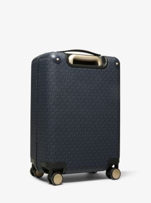 Our logo-print canvas suitcase is the definition of first-class style. Complete with reinforced leather corners and sleek hardware this carry-on piece features 360-spinning wheels and opens to a compartmented interior to keep the essentials in place during long-haul flights. Rectangular Coated Canvas Luggage For Business Trips, Classic Coated Canvas Luggage With Sleeve, Business Luggage With Luggage Sleeve In Coated Canvas, Rectangular Coated Canvas Business Luggage, Designer Luggage With Sleeve For Travel, Designer Business Luggage With Sleeve, Designer Travel Cases With Luggage Sleeve, Luxury Coated Canvas Luggage With Sleeve, Designer Luggage With Sleeve For Trip