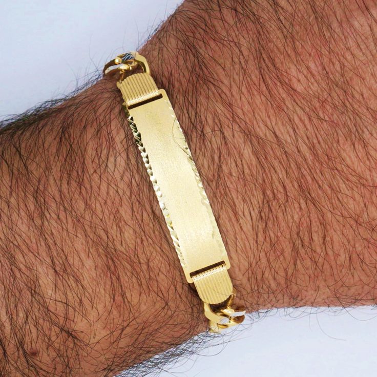 14k Yellow Solid Gold Figaro Link ID Bracelet Elevate your accessory game with our 14k Yellow Gold Men's Figaro Link ID Bracelet. This stunning piece combines classic elegance with a modern twist, perfect for both men and women. Made with high-quality 14k gold, this bracelet features a stylish Figaro link design that is sure to turn heads. Add a personal touch with the customizable ID plate, making this bracelet a unique and meaningful addition to your jewelry collection. .14K Yellow Solid Gold Engraved 14k Gold Bracelet For Formal Occasions, Formal Engraved 14k Gold Bracelet, Formal 14k Gold Engraved Bracelet, 14k Gold Curb Chain Nameplate Jewelry, 14k Gold Engraved Bracelets For Formal Occasions, Luxury 14k Gold Bracelets With Curb Chain, Engraved 14k White Gold Bracelets, Luxury 14k Gold Bracelet With Curb Chain, Engraved 14k Yellow Gold Bracelet