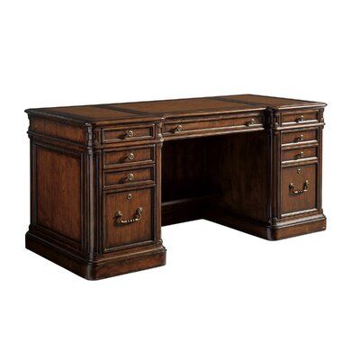 an antique style desk with two drawers