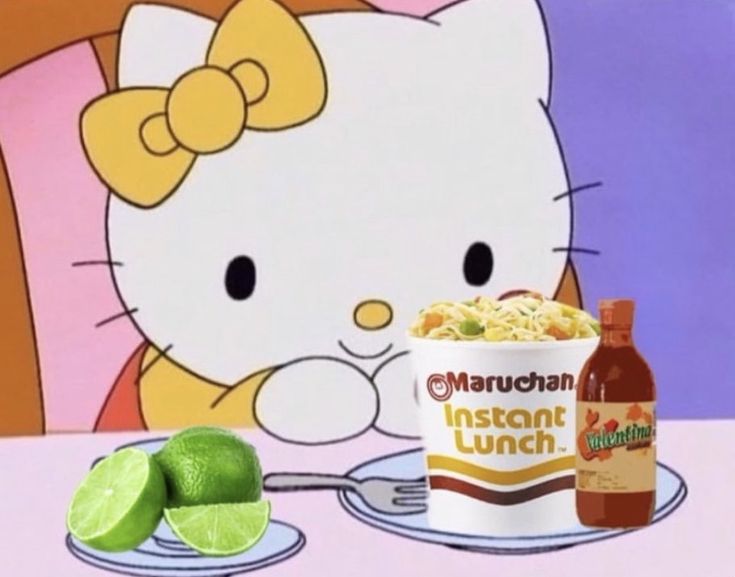 an image of a hello kitty eating some food