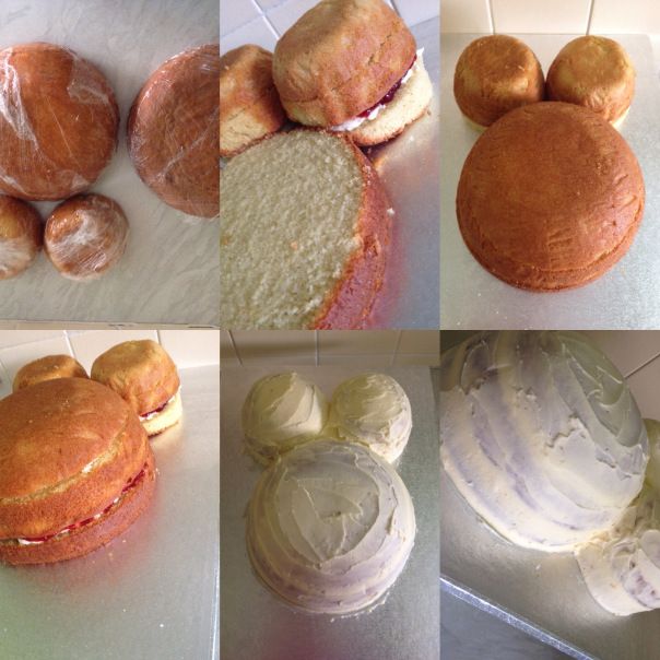 there are many different types of pastries on the counter top, including buns and rolls