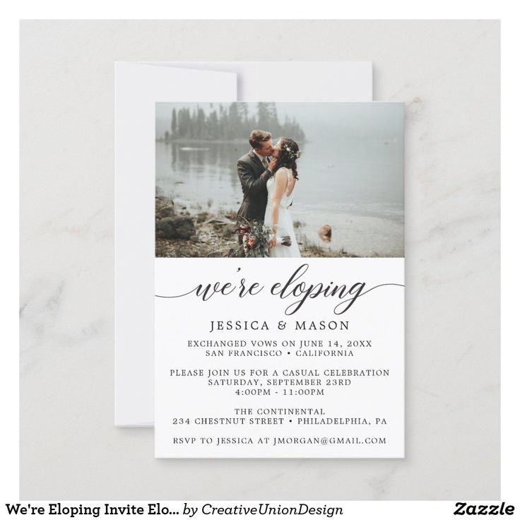 the wedding announcement card features an image of a couple kissing in front of a lake