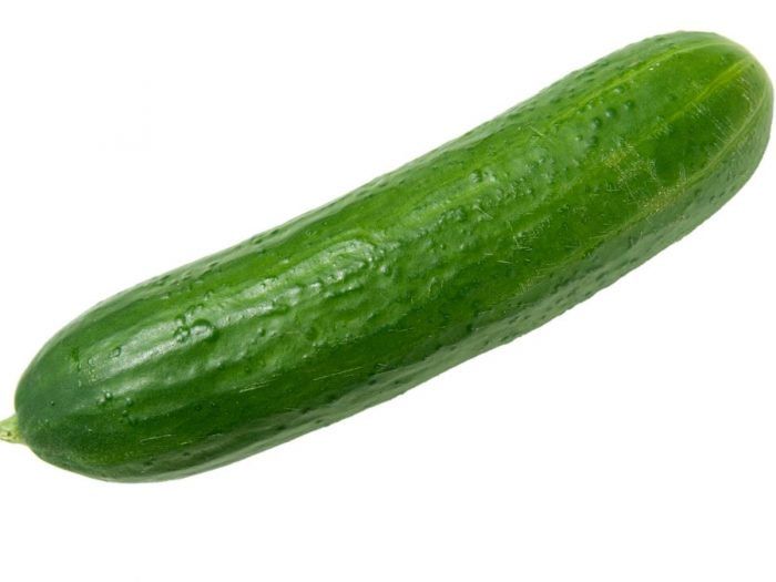 a large green cucumber on a white background