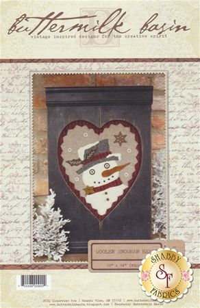 an image of a snowman heart on the front of a mailbox with writing