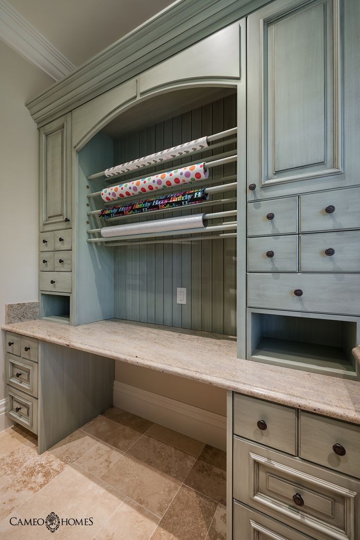 an organized closet with drawers, shelves and other items on the countertop in a home