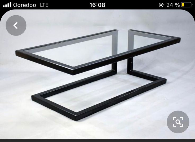 an image of a table with glass top on the app store's website page