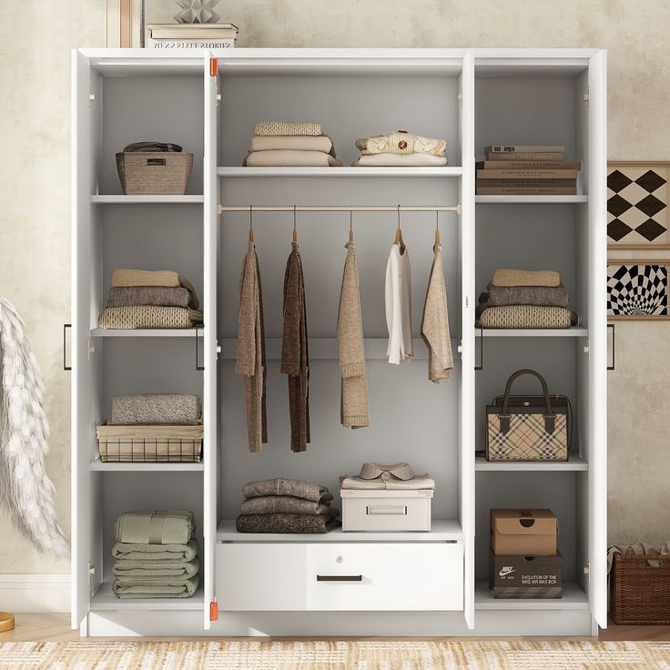 an organized closet with clothes and other items