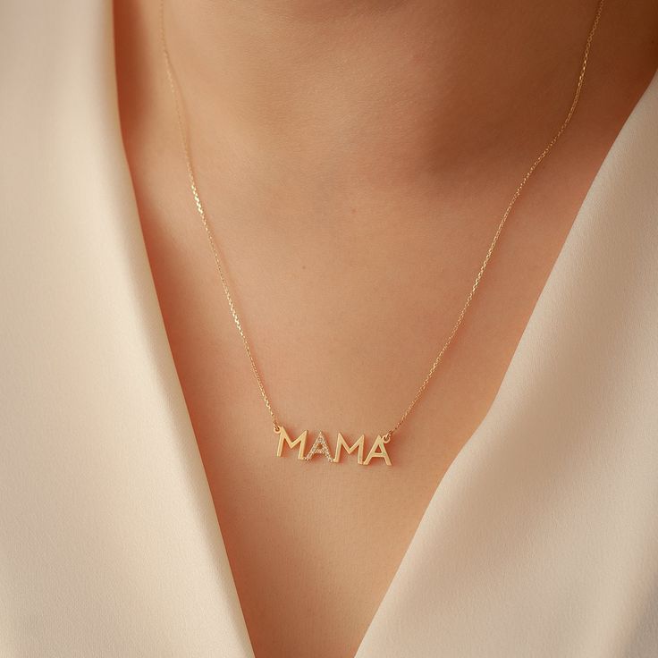 14K Solid Gold Diamond Mama Necklace, Cz Zircon Mama Necklace, Dainty Delicate Plain Gold Mama Necklace is a Great Mother's day Gift for Mom. Material: Solid Gold (no gold filled or no gold plated material) Karat: 14 K (585) Mama Pendant Height: 7 mm (0.28 inches) Mama Pendant Width: 2.5 - 2.60 cm (0.98 - 1.02 inches) Measurements may vary due to handwork. Diamond Mom Necklace >> Diamond Weight: 0,06 - 0,08 ct  >> Number of diamonds: 10 >> Diamond Color: G - H color >> Diamond Clarity: SI You ca Birthday White Gold Necklace With Cubic Zirconia, White Gold Cubic Zirconia Birthday Necklace, Personalized Cubic Zirconia Necklace For Mom, Personalized Cubic Zirconia Necklace For Mother's Day, Elegant Cubic Zirconia Necklace For Birthday, White Gold Necklace For Birthday, Mother's Day, Mother's Day Cubic Zirconia Charm Necklace, Mother's Day Dainty Diamond Accent Necklaces, Mother's Day Dainty Necklace With Diamond Accents