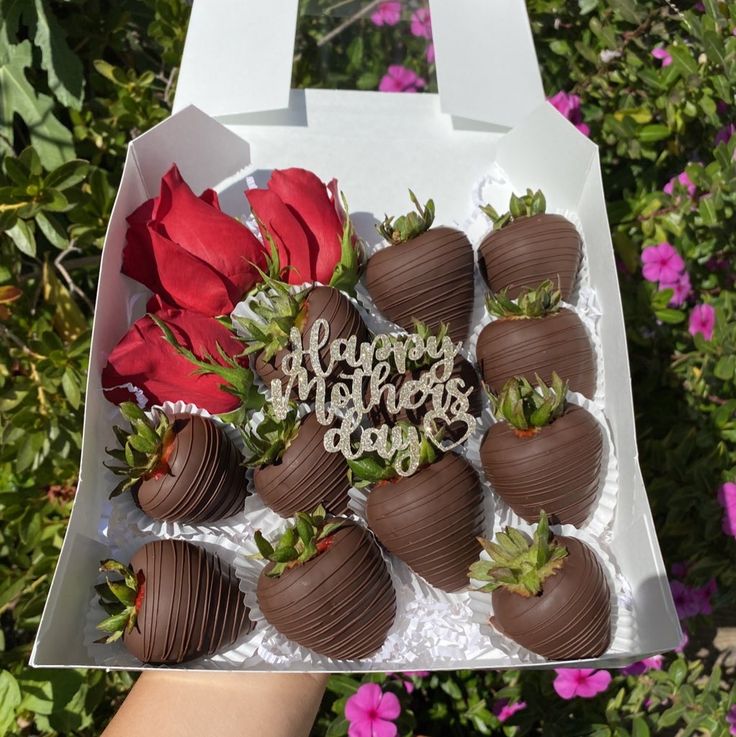 chocolate covered strawberries with happy mother's day written on them in a box