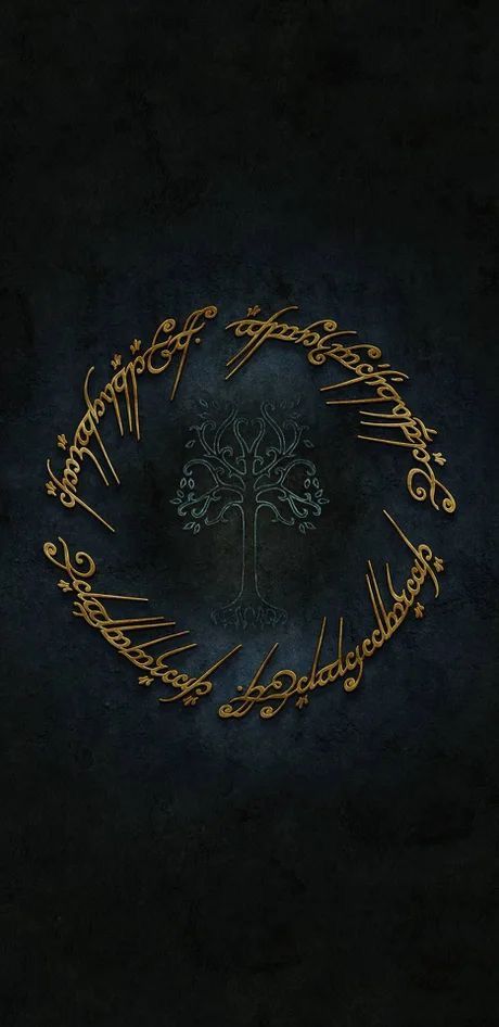 the lord of the rings logo on a black background with gold lettering and an image of a tree