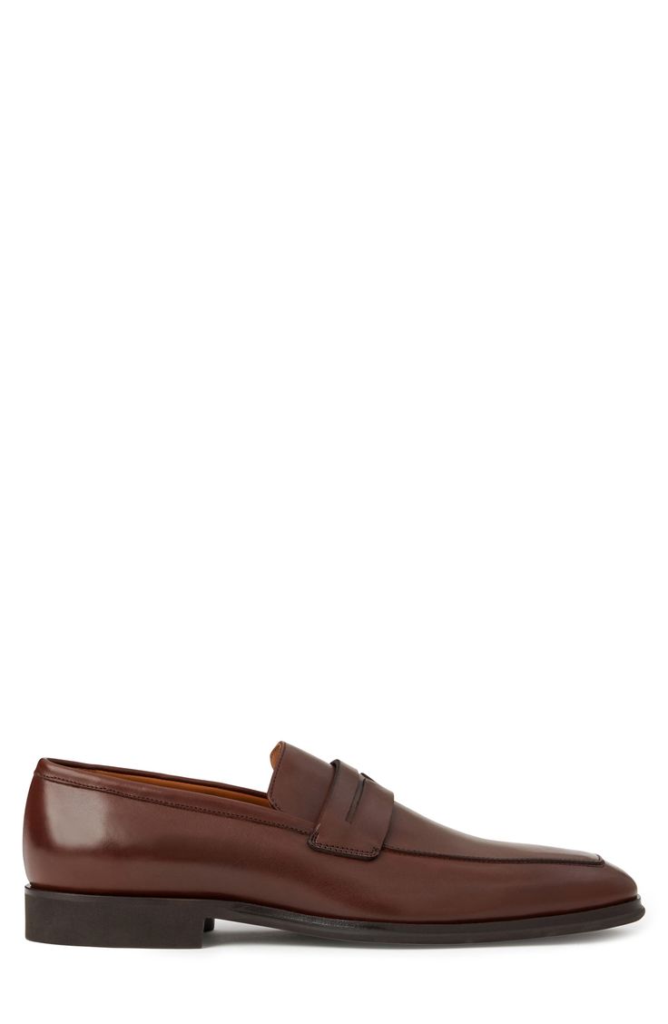 A full-length rubber sole and leather lining enhance the overall comfort of this Italian-crafted penny loafer. Leather upper and lining/rubber sole Made in Italy Brown Semi-formal Loafers With Removable Insole, Cognac Loafers With Moc Toe And Leather Sole, Cognac Loafers With Rubber Sole For Business, Timeless Brown Loafers With Removable Insole, Brown Timeless Loafers With Removable Insole, Cognac Leather Sole Loafers For Office, Cognac Loafers With Rubber Sole For Work, Cognac Round Toe Loafers For Business, Cognac Leather Sole Loafers For Business