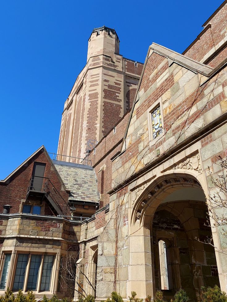 an old brick building with a clock tower