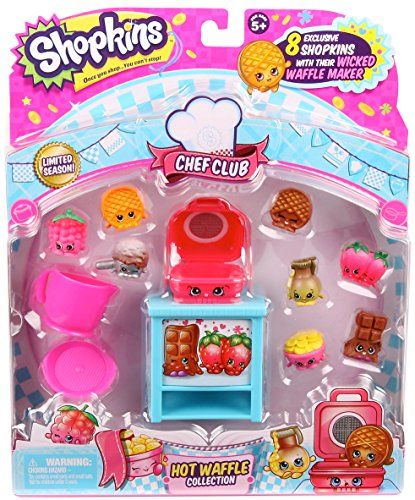 a toy kitchen set in the packaging for children's play food and pretend toys