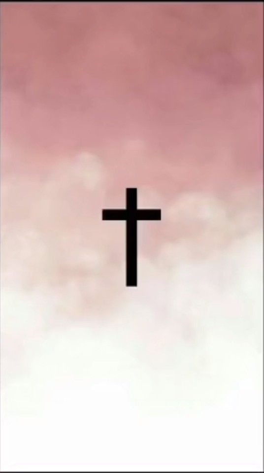 a cross is silhouetted against a pink sky with clouds in the foreground and an airplane flying overhead