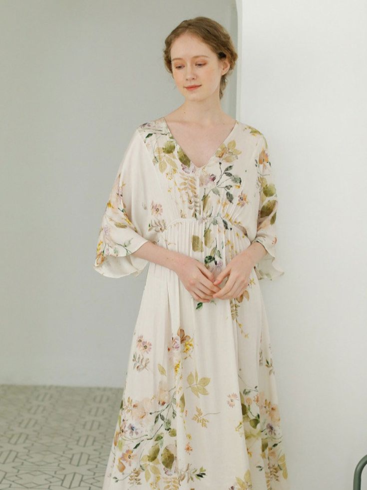 Styles: Elegant Material: Viscose Clothing Length: Mid-Calf Sleeve Length: Half Sleeve Collar: V-Neck Pattern: Floral Season: Summer #silk #pajamas #dress #homewear White V-neck Loungewear Dress, Floral Print V-neck Loungewear Dress, Feminine V-neck Nightgown For Spring, Feminine V-neck Summer Sleepwear, Spring Floral Print Nightgown For Pajama Party, Long Sleeve Summer Nightgown With Relaxed Fit, White Dress For Pajama Party In Spring, Relaxed Fit Summer Nightgown For Pajama Party, White Floral Print Dress For Pajama Party