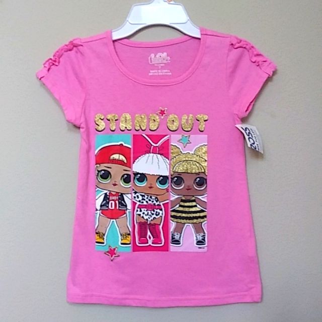 New With Tag L.O.L. Surprise! Short Sleeves Tee In Pink With Gold Glitter Accents On Dolls Design. Size: 7 Smoke And Pet Free Home Trendy Pink T-shirt With Character Print, Playful Pink Cartoon Print Top, Pink Cute Shirt With Character Print, Cute Pink Shirt With Character Print, Playful Pink Tops With Character Print, Pink T-shirt With Character Print For Summer, Playful Pink T-shirt For Playwear, Playful Pink Crew Neck Top, Pink Character Print Tops For Summer