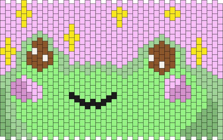 a pixellated image of a green monster with yellow eyes