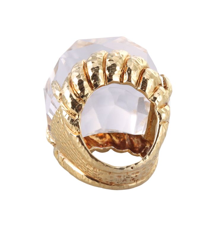 18k gold Iceberg ring by David Webb, with faceted crystal. Retail $22000. DESIGNER: David Webb MATERIAL: 18k Gold GEMSTONES: Crystal DIMENSIONS: Ring size 4.5, top is 28mm x 25mm, sits approx. 23mm from the top of the finger. MARKED/TESTED: Webb 18k. WEIGHT: 35.4 grams CONDITION: Previously Owned/Excellent Condition Elegant Faceted Crystal Ring For Formal Occasions, Luxury Faceted Rings For Formal Occasions, Formal Oval Faceted Crystal Ring, Formal Faceted Oval Crystal Ring, Luxury Gold Crystal Ring With Diamond Cut, Gold Crystal Ring With Diamond Cut In Luxury Style, Formal Diamond Cut Crystal Ring, Faceted Crystal Ring For Formal Occasions, Luxury Faceted Crystal Ring For Anniversary