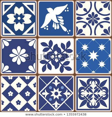 blue and white tiles with different designs on them stock photo, royalty - free image