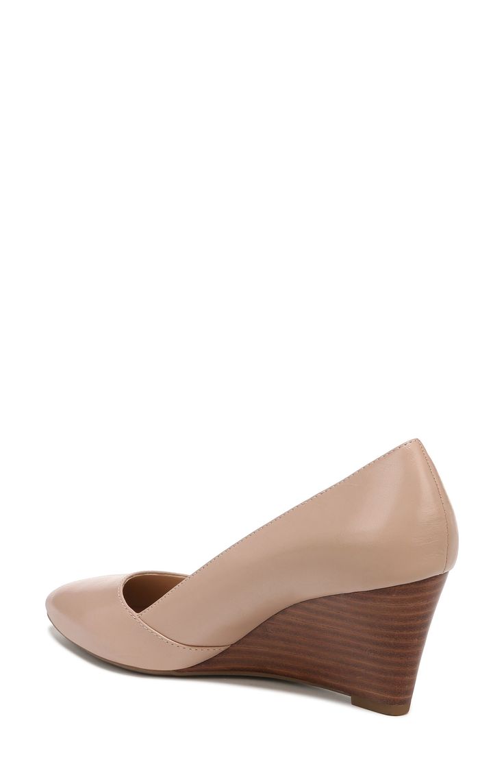 An elegant pointed-toe silhouette sits atop a comfortable stacked wedge heel that pairs easily with both casual or more styled-up outfits. 2 1/2" heel Stacked wedge heel Leather upper/synthetic lining and sole Imported Modern Wedge Heels With Reinforced Heel, Casual Office Wedge Heels, Spring Pointed Toe Medium Width Wedge Sandals, Elegant Wedge Sandals With Sculpted Heel, Formal Wedge Sandals With Stacked Heel, Chic Pointed Toe Wedge Sandals With 4-inch Heel, Closed Toe Wedge Sandals For Spring Workwear, Elegant Leather Wedge Sandals With Reinforced Heel, Chic Pointed Toe Wedge Sandals For Formal Wear