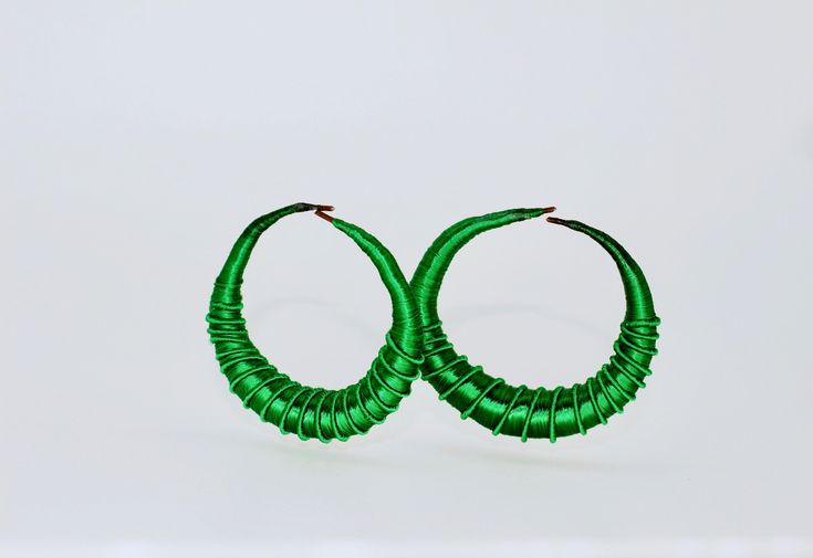 The Miriam Hoops are traditional earrings hand made by artisans in Gambia using traditional techniques exclusive to the artisans know as the Tegaa. These crafting techniques are only accessed within this artisan group and passed down through generations. The hoops are hand-wrapped in multi-color dyed eco-silk threads with spiral detailing. Pair with the matching stackable Rohey cuff for sustainable resortwear at it's finest! Hand made in Gambia Eco-friendly & sustainable 5% of proceeds donated t Puka Shell Necklace, Best Boss, Puka Shell, Traditional Earrings, Sustainable Brand, Hand Wrap, Shell Necklaces, Silk Thread, Eco Conscious