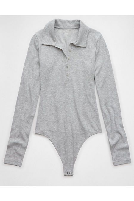 Super soft ribbed fabric/Collared neck with button placket/Thong bottom for a clean look under clothes Stretch Tops With Button Closure For Loungewear, Casual Cotton Bodysuit For Winter, Fitted Solid Bodysuit With Button Closure, Fitted Bodysuit With Button Closure, Fall Long Sleeve Bodysuit With Button Closure, Casual Bodysuit For Workwear In Winter, Casual Winter Bodysuit For Workwear, Casual Winter Workwear Bodysuit, Fitted Long Sleeve Bodysuit With Buttons