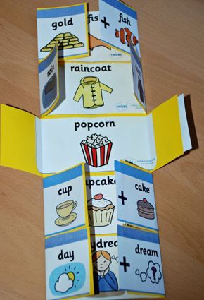 an origami cut out of paper with pictures of food and words