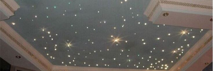 the ceiling is decorated with stars and lights