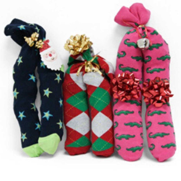 three christmas stockings are lined up next to each other