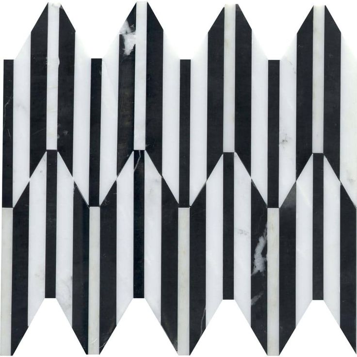 black and white marble tiles with diagonal stripes