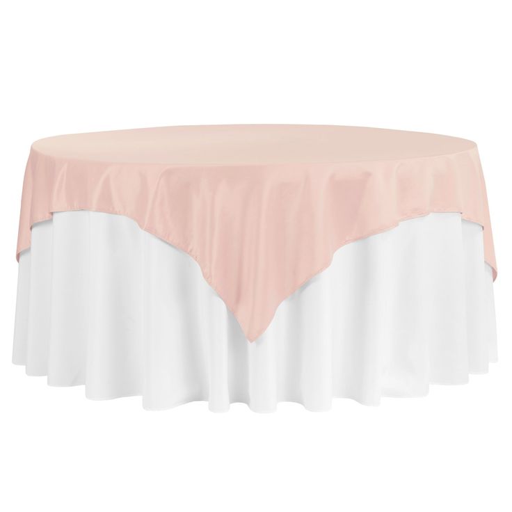 a round table with a pink and white cover