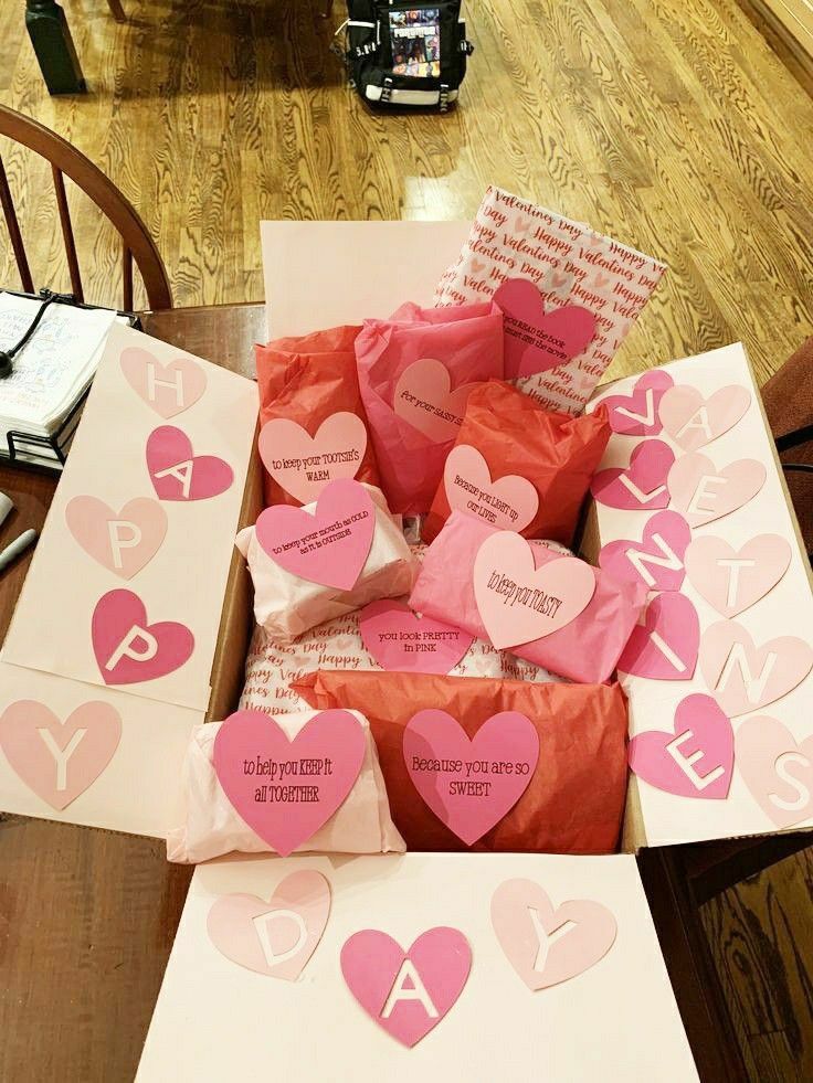 valentine's day cards in a box on the table