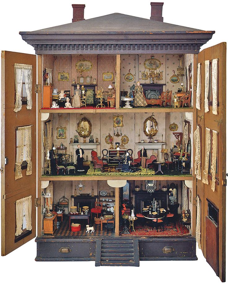 a doll house with furniture and accessories in it's display case, including an open door