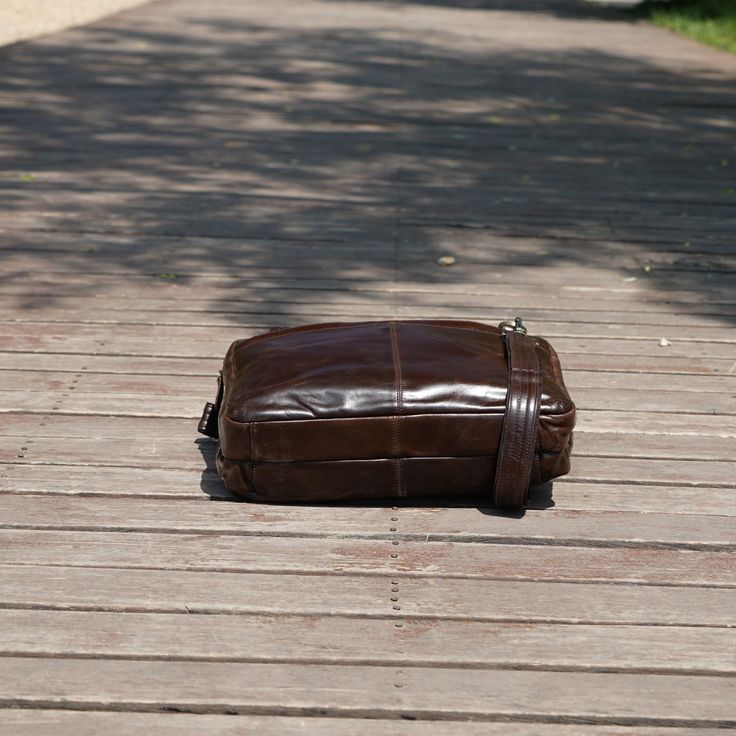 Crafted from the fine, vintage-look leather, this highly functional messenger bag is designed to tote everything from documents to your laptop. It has inside compartments which are ideal for storing a laptop (up to 15. 6'') and A4 documents, and other interior pockets for storing things like your charger, and mobile phone.  This bag features removable and adjustable straps. The front flap has a zip closure, and it comes with multiple compartments Outer 100% vegetable tanned, genuine (cowhide) leather, which develops worn look patina. Inner 30% cotton, 70% polyester, cloth lined. Use professional leather caring kit. Leather Crossbody Briefcase With Luggage Sleeve, Leather Travel Bag With Laptop Sleeve For Everyday Use, Business Leather Backpack With Removable Pouch, Rectangular Leather Lined Shoulder Bag For Business Trips, Leather Shoulder Bag With Luggage Sleeve Rectangular, Leather Shoulder Bag With Luggage Sleeve, Rectangular Leather Shoulder Bag With Luggage Sleeve, Everyday Leather Rectangular Shoulder Bag, Rectangular Shoulder Bag With Leather Lining For Business Trips