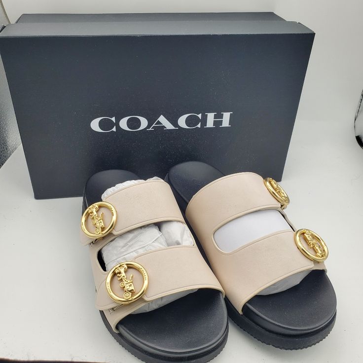 Nwt Condition, Only Tried On Indoors. Coach Open Toe Sandals With Leather Sole, Coach Sandals With Buckle Closure And Round Toe, Chic Coach Sandals With Buckle Closure, Coach Luxury Open Toe Sandals, Luxury Open Toe Coach Sandals, Chic Leather Flat Slides, Chic Flat Leather Slides, Chic Beige Sandals With Buckle Closure, Elegant Beige Leather Slides