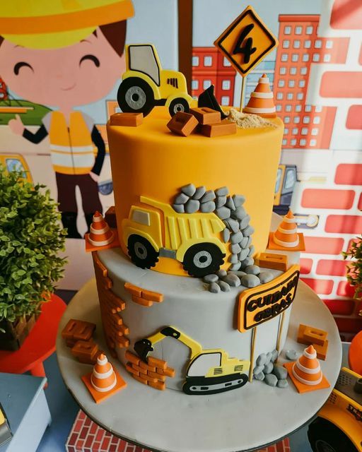 a construction themed birthday cake on a table