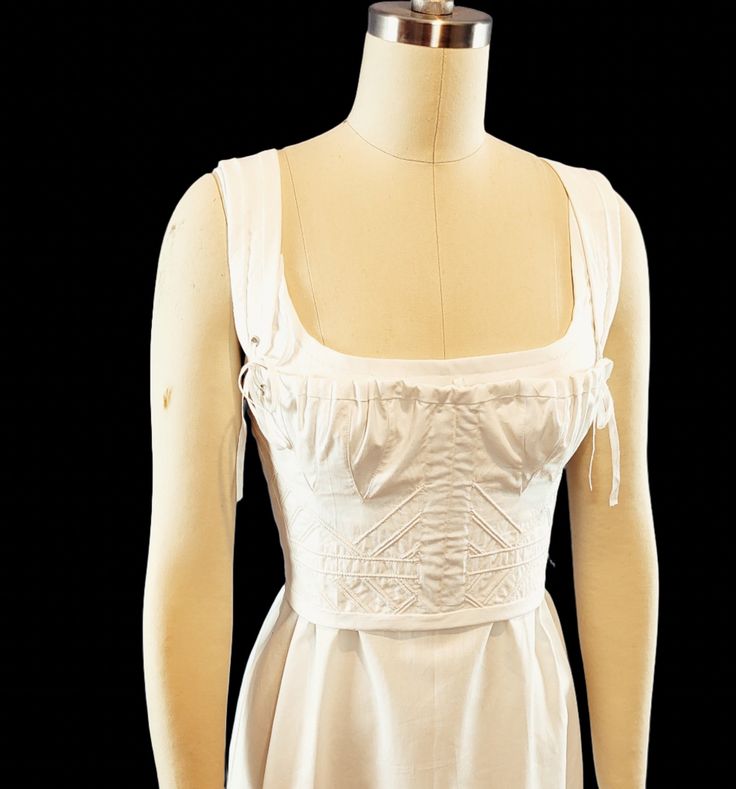 Beautifully and delicate looking short stay, corded with sturdy cotton cord. The front of this corset has 2 flat steel bones that rest between the gored bust panels. The bust is adjustable with a gathering cord. The straps are adjustable. Made with 100% cotton. This stay/corset gives the perfect support and silhouette for Regency gowns, as well as my Italian Renaissance style gowns. Time to make is set at 4-6 weeks, however if you need something sooner please feel free to message me. I can usual Corset With Adjustable Straps And Underwire, Corset With Adjustable Straps And Underwire Support, Underwire Corset With Adjustable Straps And Fitted Bodice, Adjustable Straps Underwire Corset With Fitted Bodice, Fitted Bodice Sleeveless Corset With Straps, Fitted Bodice Underbust Corset With Straps, Strap Corset With Fitted Bodice And Sleeveless Design, Sleeveless Corset With Straps And Fitted Bodice, Corset With Adjustable Spaghetti Straps And Fitted Bodice