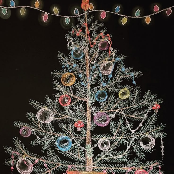 a small christmas tree is decorated with colorful ornaments and lights on a black background,