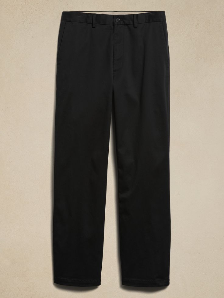 A timeless trouser returns.  Our designers reimagined the classic Dawson pant with its relaxed silhouette in our newest Rapid Movement Chino fabrication.  Now made using in-conversion cotton, this new pant strikes the balance between old-school tailoring and new-school performance.  Stretch, Fit Retention, Water-Repellent DAWSON RELAXED FIT: Mid-rise.  Relaxed through hip and thigh with a straight leg.  IN-CONVERSION-COTTON: Banana Republic is committed to sourcing organic cotton, as well as in- Classic Relaxed Fit Wide-leg Chinos, Classic Wide-leg Relaxed Fit Chinos, Cotton Wide-leg Dress Pants For Work, Classic Wide-leg Chinos For Workwear, Classic Relaxed Fit Chinos For Work, Classic Relaxed Fit Work Pants For Business Casual, Classic High-waisted Cotton Chinos, Classic Relaxed Fit Straight Leg Work Pants, Classic Straight Leg Work Pants With Relaxed Fit