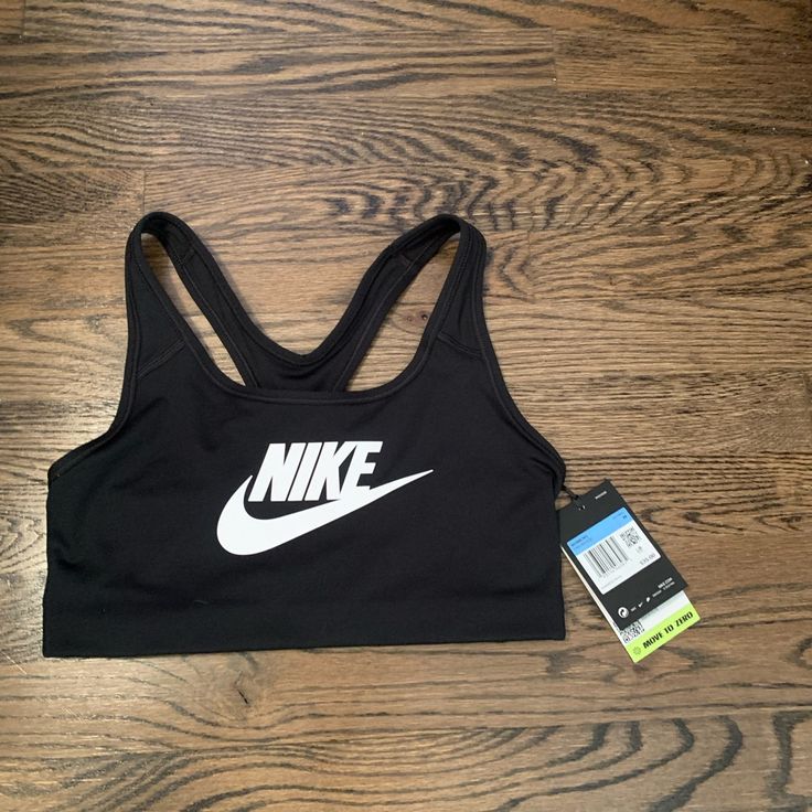 Brand New Nike Sports Bra! Never Worn, Tags Are Still Attached! Casual Sports Bra For Training, Casual Sweat-resistant Racerback Activewear, Casual Racerback Sweat Resistant Activewear, Fitted Casual Activewear For Sports, Fitted Casual Activewear For Sports Events, Casual Medium Support Sports Bra For Training, Nike Casual Activewear For Training, Black Activewear With Logo Print For Sports Season, Black Cotton Sports Bra For Gym